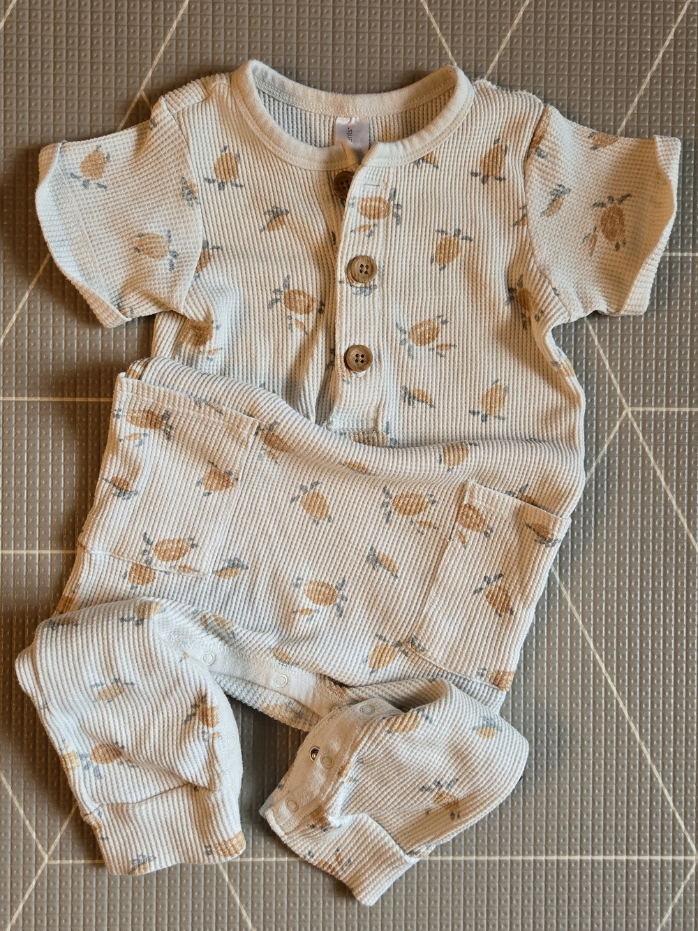 Soft Waffle Cream Baby One-Piece with Turtle Print